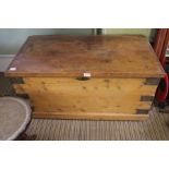 A 19th century pine trunk, with carrying handles, 99cm wide