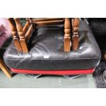 A retro design black and red leather topped stool
