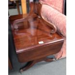 A reproduction mahogany coffee table