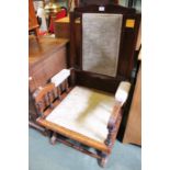 A stained wood framed rocking chair, upholstered seat and back.