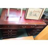 A reproduction red leather and mahogany coloured twin pedestal desk + filing cabinet