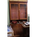 A Georgian design walnut display cabinet, two glazed doors over two cupboard doors below, 111cm x 20