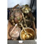 A selection of domestic brass and copperwares