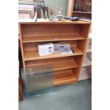 a 4 shelf mid century bookcase sliding glass doors