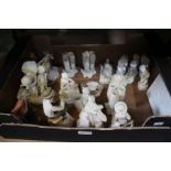 A box containing various porcelain figurines