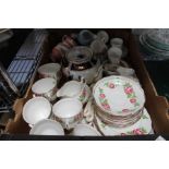 A box containing Royal Crown Derby, Royal Worcester and other tea wares