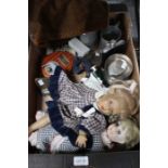 A box containing a selection of useful and collectible items, pewter tankards, horse brasses dolls e