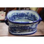 A reproduction blue & white foot bath