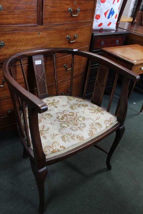 An Edwardian mahogany horseshoe backed chair with boxwood stringing and a pad seat
