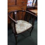 An Edwardian mahogany horseshoe backed chair with boxwood stringing and a pad seat