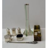 JB Chatterley & Sons, a silver three piece condiment set, a cased pair of silver napkin rings, a pai