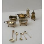 Mappin and Webb, a double silver table cruet, Georgian design, comprising two of each, lidded mustar