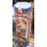 A porcelain cylindrical stick stand finished in the Japanese Amari pallet 61 x 21 cm