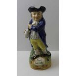 A 19th century Staffordshire pottery character jug inscribed "Hearty Good Fellow" 28 cm