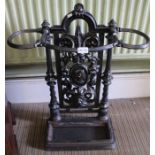 A cast iron stick stand with the head of Minerva and drip tray 73 cm high