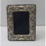 A Victorian design embossed silver photograph frame, Birmingham 1991, to display and image 12cm x 8c