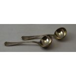 Elizabeth Eaton, A pair of Victorian silver sauce ladles, London 1854, monogramed "W", combined weig