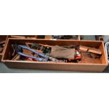A wooden box containing various vintage woodworking tools etc
