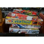 Four boxed car racing games to include Scalextric