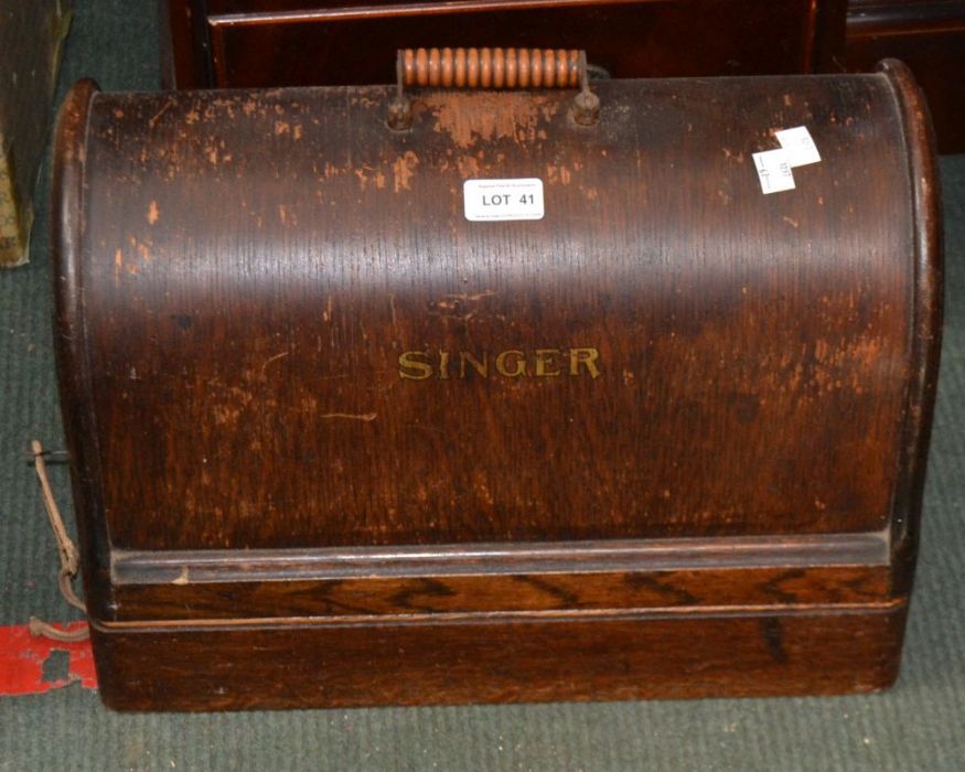 A cased Singer sewing machine