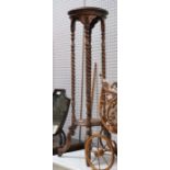 A two tier jardinière stand barley twist columns fancy legs