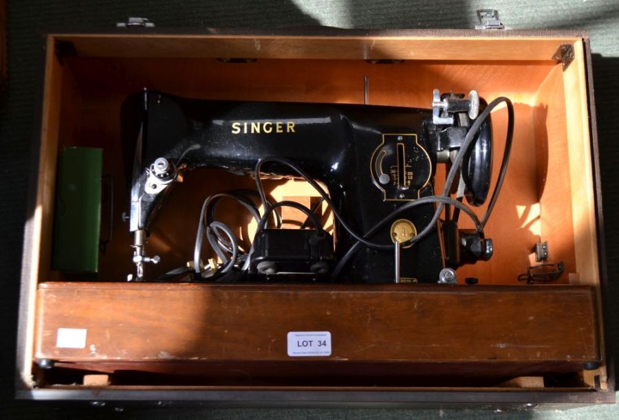 A cased Singer sewing machine