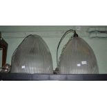 A pair of large hanging glass ceiling lights, originally hanging in a Cotswold public house