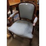 A modern show wood framed French design armchair with pale blue upholstery 95 cm high