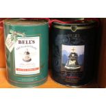 Two Bells whisky decanters, in tins