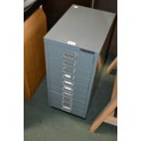 A small metal chest of filing drawers