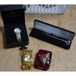 A "Claude Valentini" wrist watch in original box, a "Texto" chain bracelet watch, butterfly brooch a
