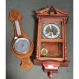 An oak backed barometer thermometer and modern Viennese wall clock