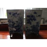A pair of blue and white oriental planters of square form