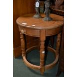 Small pine circular table with drawer