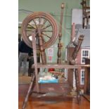 An oak Saxony style spinning wheel circa 1900