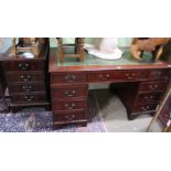 A reproduction mahogany twin pedestal desk together with matching two drawer filing cabinet