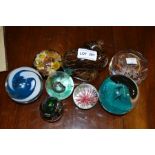 Eight decorative glass paperweights