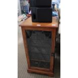 A Sony multi-component stereo system house on oak effect case with speakers and remotes