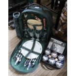 A picnic knapsack with a cased set of boules