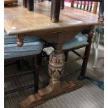 A reproduction oak Refectory table on carved cup and cover supports 73 x 52 cm