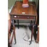 A brass inlaid Pembroke table