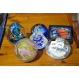 Six decorative glass paperweights various