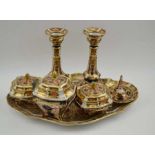 A Royal Crown Derby Imari pattern dressing table set, comprising shaped tray 32cm, a pair of candles