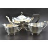 Barker Brothers Silver Ltd. A silver three-piece tea set, Birmingham 1936, combined weight: 1022g (i