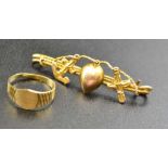 A 9ct gold, child's expandable ring, together with a 14k brooch, decorated with an anchor, and a cro