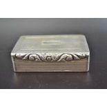John Bettridge, An early 19th century silver snuff box, engine turned decoration, floral cast thumb