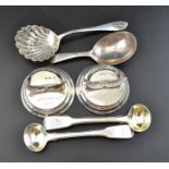 Robert Rutland, A George II silver caddy spoon, London 1812, together with a silver sugar sifting la