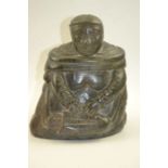A 20th century Inuit soapstone carving, mother & baby, inscribed, incised numbers to base, 21cm high