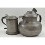 A squat form lidded pewter jug inscribed "Waterloo Hotel", together with a pewter lidded tankard