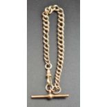 A 9ct rose gold watch chain, with "T" bar and clip, 10.5g